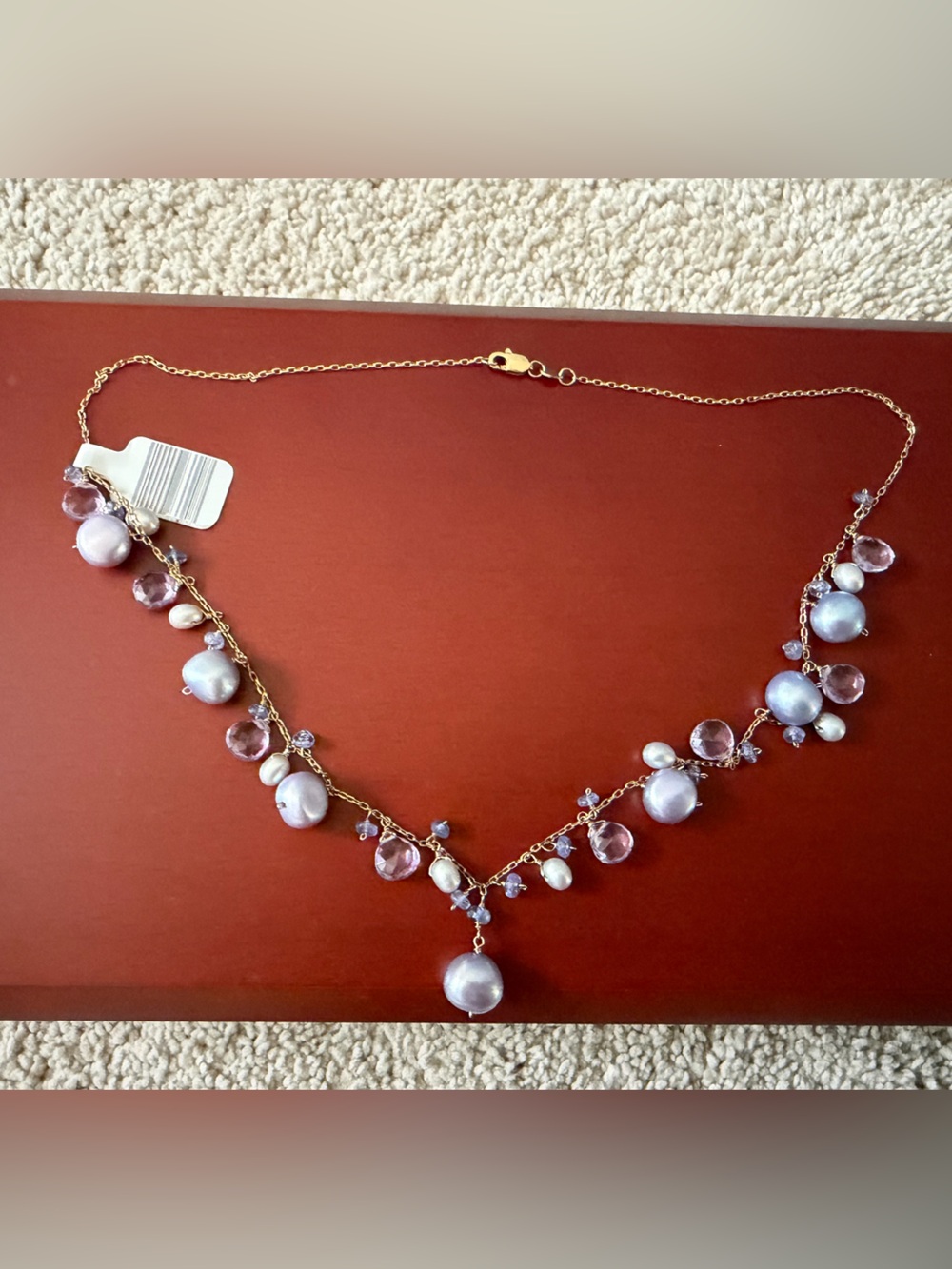 14k yellow gold, cultured freshwater pearl, amethyst, and tanzanite necklace.